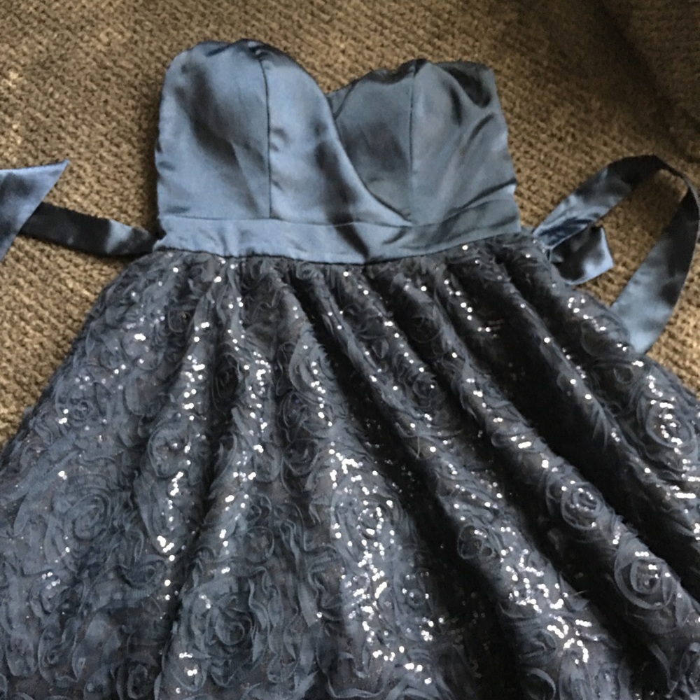 Dark blue, strapless dress.
